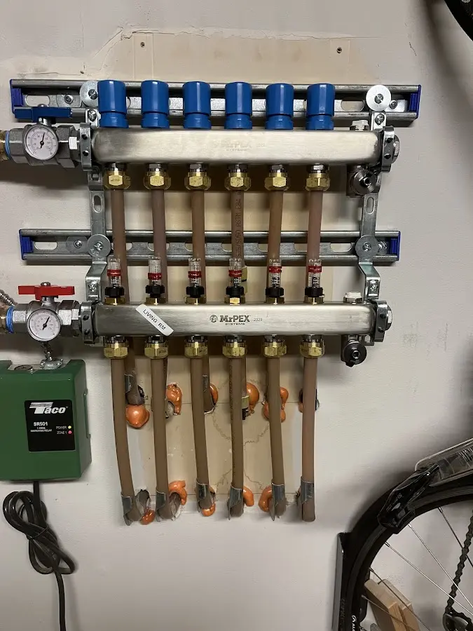 Plumber performing Leak Detection at a residential property in Middlesex